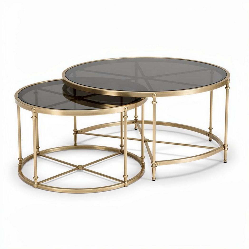 Gold metal nesting coffee tables with black glass tops set of two